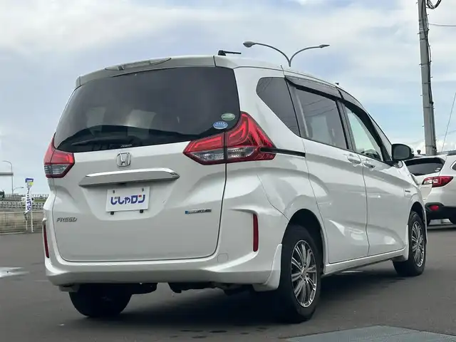 ホンダ フリード ハイブリット G ホンダセンシング 道北・旭川 2017(平29)年 12.6万km ホワイトオーキッドパール (株)IDOMが運営する【じしゃロン旭川店】の自社ローン専用車両になります。こちらは現金またはオートローンご利用時の価格です。自社ローンご希望の方は別途その旨お申付け下さい・/　/・純正ナビ(CD/BT/SD/ワンセグ)/・バックカメラ/・ビルトインETC/・レーダーブレー/・クルーズコントロール/・ステアリングリモコン/・両側パワースライドドア/・両席シートヒーター/・プッシュスタート/・スマートキー2個/・フォグランプ/・取扱説明書