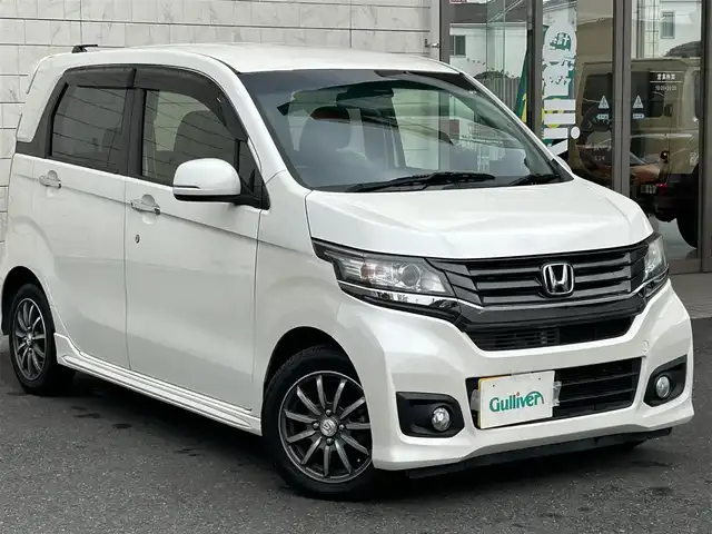 ホンダ Ｎ ＷＧＮ カスタム G ターボパッケージ 埼玉県 2014(平26)年 8.3万km プレミアムホワイトパール 純正ナビ（AM/FM/TV/BT）/クルーズコントロール/純正14インチアルミホイール/純正フロアマット/ハーフレザーシート/パドルシフト/ドアバイザー/Aストップ/キノセンヘッドライト/ステアリングリモコン/プッシュスタート/スマートキー/車両取扱説明書
