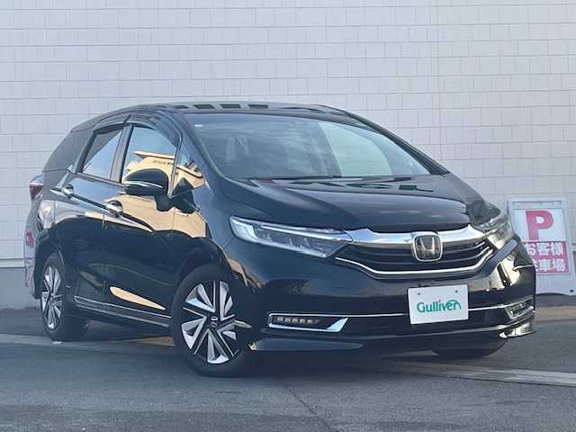 ホンダ シャトル ハイブリッド X ホンダセンシング 奈良県 2020(令2)年 1.3万km クリスタルブラックパール ●純正ナビ/(フルセグ/CD/DVD/Bluetooth/iPod)/(ギャザズ/VXM-204VFi)/●ハーフレザーシート/●前席シートヒーター/●バックカメラ/●アダプティブクルーズコントロール/●衝突被害軽減システム/●レーンキープアシストシステム/●LEDヘッドライト＆フォグランプ/●オートライト/●革巻きステアリング/●ステアリングスイッチ/●ETC/●前後ドライブレコーダー/●パドルシフト/●電動格納ウィンカーミラー/●スマートキー/●プッシュスタート/●ドアバイザー/●純正ホイールカバー/●純正フロアマット/●ダブル＋サイド＋カーテンSRS＋ABS/●車両取扱説明書/●ナビ取扱説明書