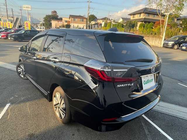ホンダ シャトル ハイブリッド X ホンダセンシング 奈良県 2020(令2)年 1.3万km クリスタルブラックパール ●純正ナビ/(フルセグ/CD/DVD/Bluetooth/iPod)/(ギャザズ/VXM-204VFi)/●ハーフレザーシート/●前席シートヒーター/●バックカメラ/●アダプティブクルーズコントロール/●衝突被害軽減システム/●レーンキープアシストシステム/●LEDヘッドライト＆フォグランプ/●オートライト/●革巻きステアリング/●ステアリングスイッチ/●ETC/●前後ドライブレコーダー/●パドルシフト/●電動格納ウィンカーミラー/●スマートキー/●プッシュスタート/●ドアバイザー/●純正ホイールカバー/●純正フロアマット/●ダブル＋サイド＋カーテンSRS＋ABS/●車両取扱説明書/●ナビ取扱説明書