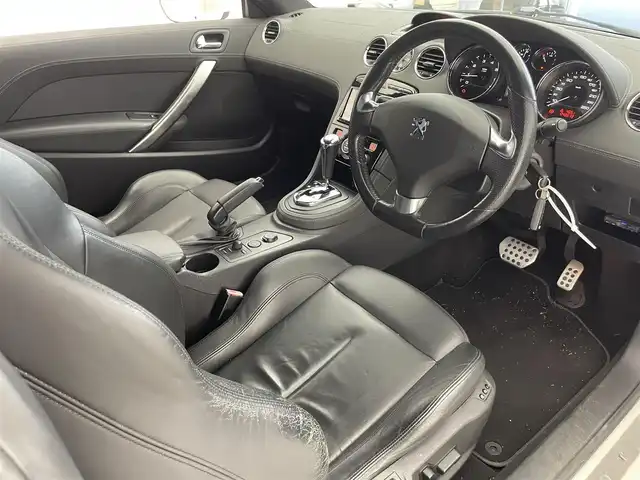プジョー ＲＣＺ 滋賀県 2012(平24)年 4.3万km パール 禁煙車/社外７型SDナビ/・CD/DVD/USB/フルセグTV/バックカメラ/黒レザーシート/シートヒーター/革巻きステアリング/コーナーセンサー/キセノンライト/純正１８AW/ETC/キーレスキー