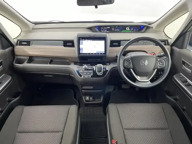 ホンダ フリード ハイブリット G ホンダセンシング 埼玉県 2020(令2)年 5万km シルバーミストグリーンM ホンダセンシング/  ACC（アダプティブクルーズコントロール）/  LKAS（車線維持支援システム）/　衝突軽減ブレーキ（CMBS）/　誤発進抑制機能/　後方誤発進抑制機能/　後方誤発進抑制機能/　歩行者事故低減ステアリング/　路外逸脱抑制機能/　先行車発進お知らせ機能/　標識認識機能/純正9インチナビ（VXM-207VFNi）/　DTV CD DVD BT iPod SD SDREC/両側パワースライドドア/バックカメラ/フリップダウンモニター/前席シートヒーター/後席サンシェード/前方ドライブレコーダー/VSA（ビークルスタビリティアシスト）/ビルトインETC/エンジンスタートボタン/スマートキー/LEDオートライト/純正フロアマット/純正アルミホイール