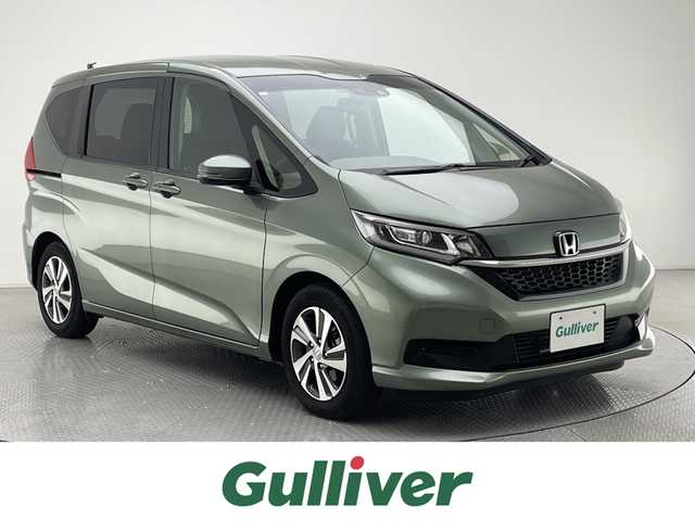 ホンダ フリード G ホンダセンシング 兵庫県 2020(令2)年 4万km シルバーミストグリーンM ワンオーナー/純正ナビ/フルセグ CD DVD BT MSV USB/両側パワースライドドア/レーダークルーズコントロール/LDA/衝突軽減ブレーキ/コーナーセンサー/ハーフレザーシート/シートヒーター/ビルトインETC/ドライブレコーダー/バックカメラ/LEDヘッドライト/オートライト/スマートキー