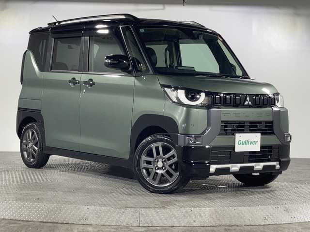 三菱 デリカミニ T プレミアム 沖縄県 2024(令6)年 1.6万km ＤグリーンⅡ 禁煙車/純正ディスプレイオーディオ/アップルカープレイ/アンドロイドオート/ターボ/４ＷＤ/デジタルルームミラー/レーダークルーズ/e-Assist/　・衝突軽減ブレーキ/　・踏み間違い衝突防止/マルチアラウンドビューモニター/両側パワースライドドア/ドライブレコーダー前後/ＥＴＣ