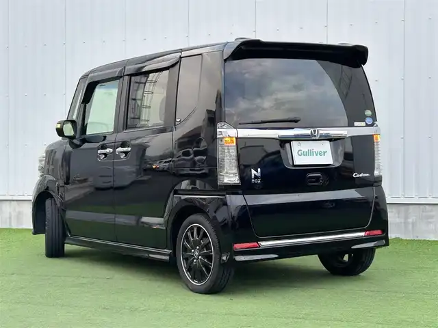 ホンダ Ｎ ＢＯＸ カスタム ターボ SSブラックSパッケージ 香川県 2016(平28)年 7.2万km クリスタルブラックパール ワンオーナー/CTBA/　・衝突回避支援システム/　・衝突被害軽減ブレーキ/　・誤発進抑制機能/オートハイビーム/VSA（横滑り防止装置）/LKAS（車線維持支援システム）/純正8インチSDナビ/　→フルセグ/CD/DVD/Bluetooth/バックカメラ/両側パワースライドドア/ハーフレザーシート/前席シートヒーター/ブルーステッチ本革巻ステアリング/ステアリングリモコン/パドルシフト/純正オールブラック15インチアルミ/リアバックテーブル/リアサンシェード/チップアップシート/サイドビューサポートミラー/ビルトインETC/プッシュスタート/アイドリングストップ