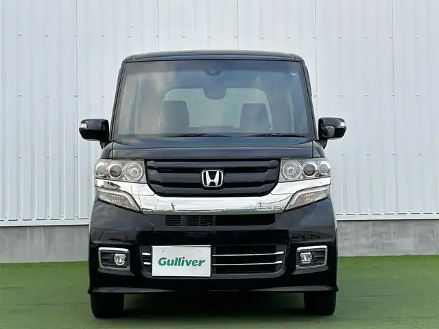 ホンダ Ｎ ＢＯＸ カスタム ターボ SSブラックSパッケージ 香川県 2016(平28)年 7.2万km クリスタルブラックパール ワンオーナー/CTBA/　・衝突回避支援システム/　・衝突被害軽減ブレーキ/　・誤発進抑制機能/オートハイビーム/VSA（横滑り防止装置）/LKAS（車線維持支援システム）/純正8インチSDナビ/　→フルセグ/CD/DVD/Bluetooth/バックカメラ/両側パワースライドドア/ハーフレザーシート/前席シートヒーター/ブルーステッチ本革巻ステアリング/ステアリングリモコン/パドルシフト/純正オールブラック15インチアルミ/リアバックテーブル/リアサンシェード/チップアップシート/サイドビューサポートミラー/ビルトインETC/プッシュスタート/アイドリングストップ