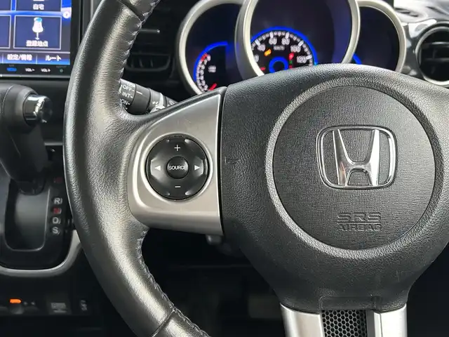 ホンダ Ｎ ＢＯＸ カスタム ターボ SSブラックSパッケージ 香川県 2016(平28)年 7.2万km クリスタルブラックパール ワンオーナー/CTBA/　・衝突回避支援システム/　・衝突被害軽減ブレーキ/　・誤発進抑制機能/オートハイビーム/VSA（横滑り防止装置）/LKAS（車線維持支援システム）/純正8インチSDナビ/　→フルセグ/CD/DVD/Bluetooth/バックカメラ/両側パワースライドドア/ハーフレザーシート/前席シートヒーター/ブルーステッチ本革巻ステアリング/ステアリングリモコン/パドルシフト/純正オールブラック15インチアルミ/リアバックテーブル/リアサンシェード/チップアップシート/サイドビューサポートミラー/ビルトインETC/プッシュスタート/アイドリングストップ