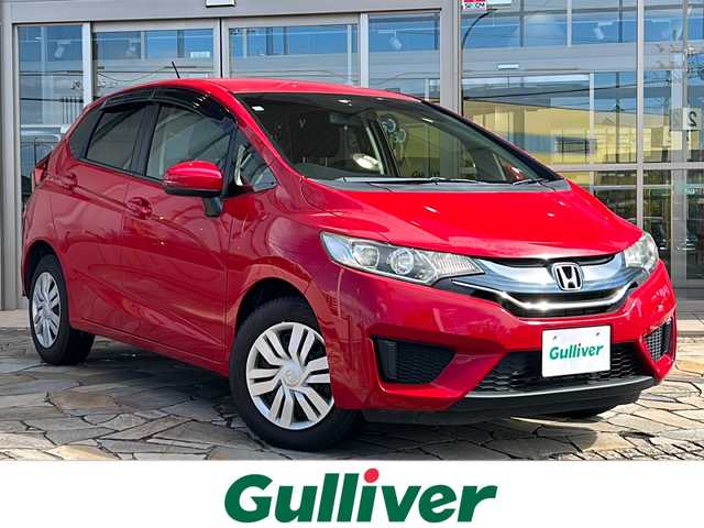 ホンダ フィット 13G Fパッケージ 静岡県 2014(平26)年 3.4万km ミラノレッド 純正ナビ/・FM/AM/・CD/DVD/・USB/・Bluetooth/・ワンセグ/・SD/主要装備/・バックカメラ/・オートエアコン/・ＥＴＣ/・オートライト/・ステアリングスイッチ/・横滑り防止装置/・プッシュスタート/・純正ホイールキャップ/・スタッドレスタイヤ/・ＬＥＤヘッドライト/・純正フロアマット