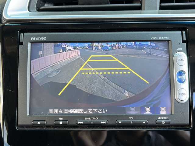 ホンダ フィット 13G Fパッケージ 静岡県 2014(平26)年 3.4万km ミラノレッド 純正ナビ/・FM/AM/・CD/DVD/・USB/・Bluetooth/・ワンセグ/・SD/主要装備/・バックカメラ/・オートエアコン/・ＥＴＣ/・オートライト/・ステアリングスイッチ/・横滑り防止装置/・プッシュスタート/・純正ホイールキャップ/・スタッドレスタイヤ/・ＬＥＤヘッドライト/・純正フロアマット