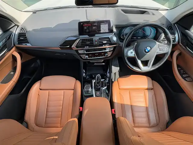 ＢＭＷ Ｘ３ 石川県 2018(平30)年 5.3万km ミネラルホワイト 茶革シート/純正ナビ/(BT/CD/DVD/ワンセグTV)/インテリジェントセーフティー/置くだけ充電/ブラインドスポットアシスト/4WD/アダプティブクルーズコントロール/電動リアゲート/シートヒーター(前席)/パワーシート(前席)/ルーフレール/純正19インチホイール/純正フロアマット/バックカメラ/アラウンドビューモニター