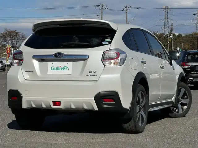 スバル インプレッサ ＸＶ ハイブリッド 2．0i－L アイサイト 道央・札幌 2014(平26)年 11.9万km サテンホワイトパール ４WD/社外SDナビ/AM/FM/BT/SD/CD/DVD/フルセグ/衝突被害軽減ブレーキ/アイサイト/横滑り防止装置/レーダークルーズコントロール/レーンキープアシスト/バックカメラ/ビルトインETC/前席パワーシート/革巻きステアリング/ステアリングリモコン/パドルシフト/MTモード付AT/プッシュスタート/スマートキー/キセノンヘッドライト/オートライト/フォグランプ/電動格納ミラー/ウィンカーミラー/純正フロアマット