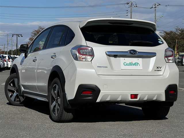 スバル インプレッサ ＸＶ ハイブリッド 2．0i－L アイサイト 道央・札幌 2014(平26)年 11.9万km サテンホワイトパール ４WD/社外SDナビ/AM/FM/BT/SD/CD/DVD/フルセグ/衝突被害軽減ブレーキ/アイサイト/横滑り防止装置/レーダークルーズコントロール/レーンキープアシスト/バックカメラ/ビルトインETC/前席パワーシート/革巻きステアリング/ステアリングリモコン/パドルシフト/MTモード付AT/プッシュスタート/スマートキー/キセノンヘッドライト/オートライト/フォグランプ/電動格納ミラー/ウィンカーミラー/純正フロアマット