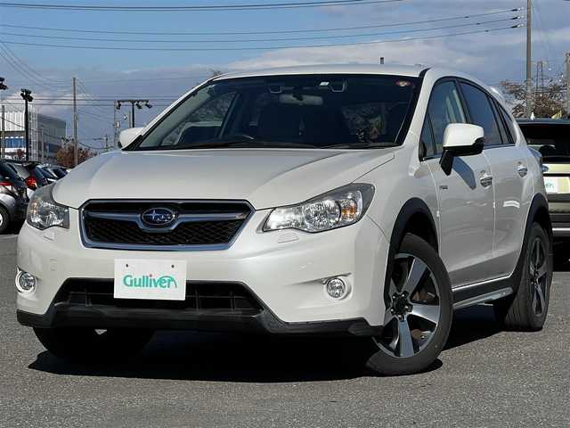 スバル インプレッサ ＸＶ ハイブリッド 2．0i－L アイサイト 道央・札幌 2014(平26)年 11.9万km サテンホワイトパール ４WD/社外SDナビ/AM/FM/BT/SD/CD/DVD/フルセグ/衝突被害軽減ブレーキ/アイサイト/横滑り防止装置/レーダークルーズコントロール/レーンキープアシスト/バックカメラ/ビルトインETC/前席パワーシート/革巻きステアリング/ステアリングリモコン/パドルシフト/MTモード付AT/プッシュスタート/スマートキー/キセノンヘッドライト/オートライト/フォグランプ/電動格納ミラー/ウィンカーミラー/純正フロアマット