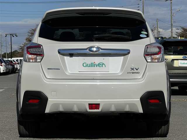 スバル インプレッサ ＸＶ ハイブリッド 2．0i－L アイサイト 道央・札幌 2014(平26)年 11.9万km サテンホワイトパール ４WD/社外SDナビ/AM/FM/BT/SD/CD/DVD/フルセグ/衝突被害軽減ブレーキ/アイサイト/横滑り防止装置/レーダークルーズコントロール/レーンキープアシスト/バックカメラ/ビルトインETC/前席パワーシート/革巻きステアリング/ステアリングリモコン/パドルシフト/MTモード付AT/プッシュスタート/スマートキー/キセノンヘッドライト/オートライト/フォグランプ/電動格納ミラー/ウィンカーミラー/純正フロアマット