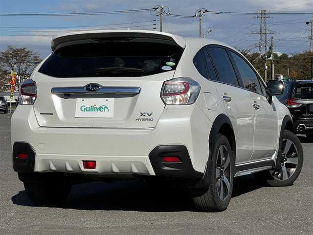 スバル インプレッサ ＸＶ ハイブリッド 2．0i－L アイサイト 道央・札幌 2014(平26)年 11.9万km サテンホワイトパール ４WD/社外SDナビ/AM/FM/BT/SD/CD/DVD/フルセグ/衝突被害軽減ブレーキ/アイサイト/横滑り防止装置/レーダークルーズコントロール/レーンキープアシスト/バックカメラ/ビルトインETC/前席パワーシート/革巻きステアリング/ステアリングリモコン/パドルシフト/MTモード付AT/プッシュスタート/スマートキー/キセノンヘッドライト/オートライト/フォグランプ/電動格納ミラー/ウィンカーミラー/純正フロアマット