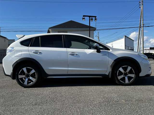 スバル インプレッサ ＸＶ ハイブリッド 2．0i－L アイサイト 道央・札幌 2014(平26)年 11.9万km サテンホワイトパール ４WD/社外SDナビ/AM/FM/BT/SD/CD/DVD/フルセグ/衝突被害軽減ブレーキ/アイサイト/横滑り防止装置/レーダークルーズコントロール/レーンキープアシスト/バックカメラ/ビルトインETC/前席パワーシート/革巻きステアリング/ステアリングリモコン/パドルシフト/MTモード付AT/プッシュスタート/スマートキー/キセノンヘッドライト/オートライト/フォグランプ/電動格納ミラー/ウィンカーミラー/純正フロアマット