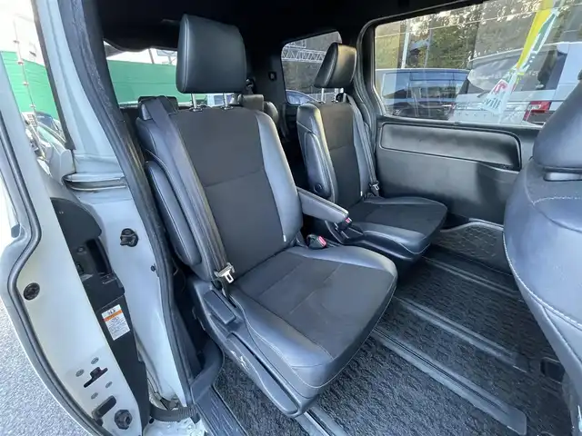 トヨタ ノア ハイブリッド Si ダブルバイビー 千葉県 2016(平28)年 14.2万km ホワイトパールクリスタルシャイン トヨタセーフティーセンス/・プリクラッシュセーフティー/・レーンキープアシスト/・オートマチックハイビーム/純正10インチSDナビ【NSZN-Z66T】/・CD/DVD/MSV/Bluetooth/フルセグTV/純正フリップダウンモニター【V9T-R59C】/両後パワースライドドア/クルーズコントロール/スマートキー/ハーフレザーシート/純正LEDヘッドライト/フォグランプ/純正16インチアルミホイール/ビルトインETC/ドアバイザー/本革巻きステアリング/新車時保証書＆取扱説明書