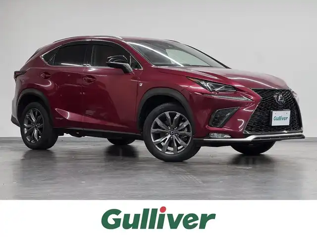 レクサス ＮＸ 300h Fスポーツ 三重県 2018(平30)年 4.1万km レッドマイカクリスタルシャイン ハイブリッド/FF/MTモード付フロアCVT/純正 10.3インチナビ/（AM/FM/CD/DVD/SDREC/SD/USB/iPod/Bluetooth/Miracast/AUX/TV）/パノラミックビューモニター（シースルービュー機能付）*/ドライブレコーダー 前方/ビルトイン ETC2.0/LEXUS Safety Sytem＋/●プリクラッシュセーフティ［PCS］（ミリ波レーダー方式）/●レーンディパーチャーアラート（ステアリング操作支援付）/●アダプティブハイビームシステム*/●レーダークルコン（全車速追従機能付）/●クリアランスソナー＆バックソナー/・ブラインドスポットモニター＆リヤクロストラフィックアラート*/など/装備/・3眼フルLEDヘッドランプ*/・AC100Vコンセント（100W）*/・本アルミ（名栗調仕上げ/シルバー）インテリア*/・ハンズフリーパワーバックドア/・本革シート（赤革）/・シートヒーター＆ベンチレーション（D/N）/・パワーシート（Dランバーサポート付8way/N8way）/・電子パーキングブレーキ＆ブレーキホールド/・雨滴感応式フロントワイパー/・アクティブサウンドコントロール（ASC）/・純正18inAW/など/*…メーカーOP