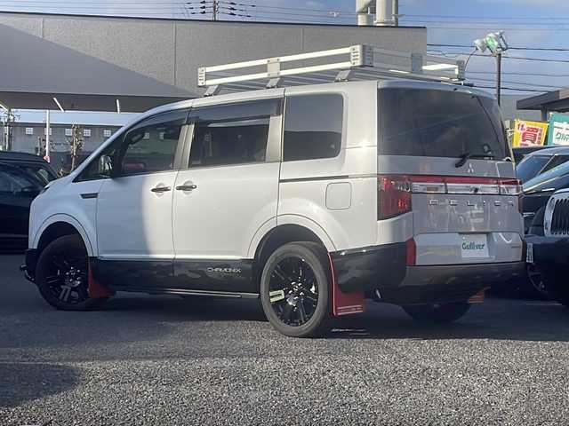 三菱 デリカＤ：５ シャモニー 秋田県 2025(令7)年 1.3万km ホワイトダイヤモンド 4WD/フリップダウンモニター/アルパインナビ/　　CD/DVD/BT/フルセグTV/バックカメラ/両側パワースライドドア/電動リアゲート/レーダークルーズコントロール/LEDオートライト/ハーフレザーシート/前席シートヒーター/運転席パワーシート/純正18インチアルミホイール/ルーフキャリア/ステアリングヒーター/パドルシフト/USBポート/スマートキー/ビルトインETC