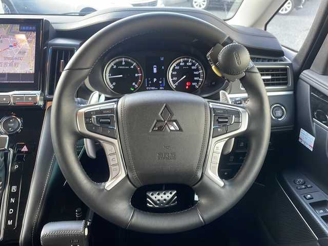 三菱 デリカＤ：５ シャモニー 秋田県 2025(令7)年 1.3万km ホワイトダイヤモンド 4WD/フリップダウンモニター/アルパインナビ/　　CD/DVD/BT/フルセグTV/バックカメラ/両側パワースライドドア/電動リアゲート/レーダークルーズコントロール/LEDオートライト/ハーフレザーシート/前席シートヒーター/運転席パワーシート/純正18インチアルミホイール/ルーフキャリア/ステアリングヒーター/パドルシフト/USBポート/スマートキー/ビルトインETC