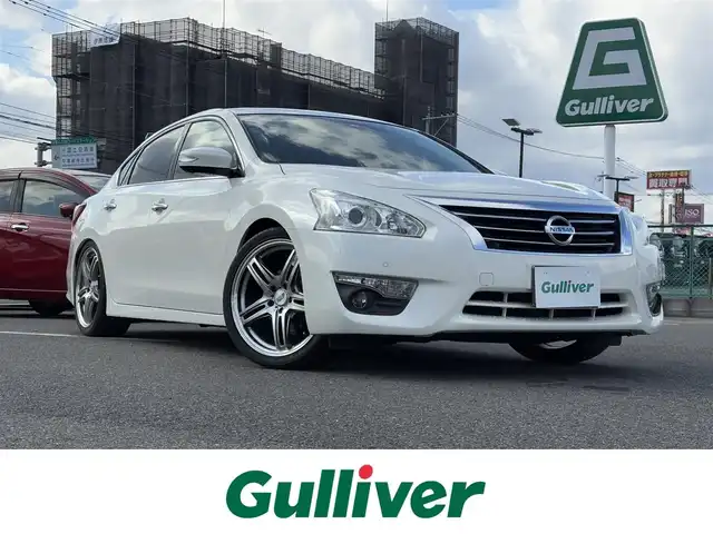 日産 ティアナ XV ナビAVMパッケージ 大分県 2019(令1)年 6.6万km ブリリアントホワイトパール ・ナビ(CD/DVD/BT/AUX/USB)/・全方位カメラ/・サンルーフ/・衝突軽減ブレーキ/・ベージュシート/・助手席電動オットマン/・パワーシート/・シートヒーター/・エアシート/・ドライブレコーダー/・ETC/・ブラインドスポット/・コーナーセンサー/・クルーズコントロール/・ステアリングリモコン/・スマートキー/・プッシュスタートボタン