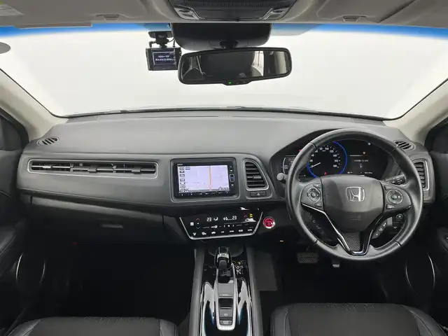 ホンダ ヴェゼル ハイブリッド Z ホンダセンシング 富山県 2019(令1)年 6.5万km クリスタルブラックパール 純正ナビ（AM/FM/CD/DVD/USB/BT）/フルセグTV/バックカメラ/寒冷地仕様/ホンダセンシング/衝突軽減ブレーキ〈CMBS〉/アダプティブ・クルーズ・コントロール/車線維持支援システム/標識認識機能/社外16インチAW/純正17インチAW付きサマータイヤ積込（2mm）/LEDヘッドライト/LEDフォグランプ/オートライト/ハーフレザーシート/前席シートヒーター/ドライブレコーダー前後/ビルトインETC/パドルシフト/プッシュスタート/アイドリングストップ/純正フロアマット/保証書