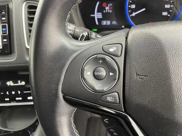ホンダ ヴェゼル ハイブリッド Z ホンダセンシング 富山県 2019(令1)年 6.5万km クリスタルブラックパール 純正ナビ（AM/FM/CD/DVD/USB/BT）/フルセグTV/バックカメラ/寒冷地仕様/ホンダセンシング/衝突軽減ブレーキ〈CMBS〉/アダプティブ・クルーズ・コントロール/車線維持支援システム/標識認識機能/社外16インチAW/純正17インチAW付きサマータイヤ積込（2mm）/LEDヘッドライト/LEDフォグランプ/オートライト/ハーフレザーシート/前席シートヒーター/ドライブレコーダー前後/ビルトインETC/パドルシフト/プッシュスタート/アイドリングストップ/純正フロアマット/保証書