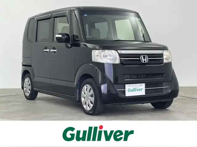 ホンダ Ｎ ＢＯＸ G Lパッケージ 大分県 2015(平27)年 6.5万km スマートブラック 純正ナビ/【CD/ワンセグ/FM/AM】/バックカメラ/片側パワースライドドア/ヘッドライトレベライザー/スマートキー/プッシュスタート/ステアリングスイッチ/横滑り防止装置/ハロゲンヘッドライト/純正アルミキャップ/純正フロアマット/電動格納ミラー