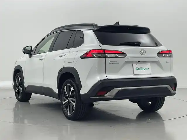 トヨタ カローラ クロス ハイブリッド Z 熊本県 2024(令6)年 1.1万km アティチュードブラックマイカ/プラチナホワイトパールマイカ トヨタチームメイト/禁煙車　/ガラスルーフ　/純正ドライブレコーダー　/全周囲カメラ　/純正１０，５型ディスプレイオーディオ　/ビルトインＥＴＣ２．０　/トヨタセーフティーセンス/・プリクラッシュセーフティ/・ロードサインアシスト/・レーンディパーチャーアラート/・レーダークルーズコントロール/・オートマチックハイビーム/・ブラインドスポットモニター/前後クリアランスソナー　/前席シートヒーター　/運転席パワーシート/パワーバックドア/ハーフレザーシート/純正フロアマット/純正１８インチAW/オートライト/LEDヘッドライト/フォグライト/スマートキー/プッシュスタート/スペアキー1本/保証書/取扱説明書