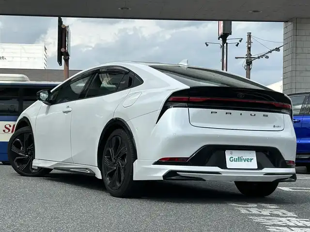 トヨタ プリウス Z 奈良県 2024(令6)年 1.6万km プラチナホワイトパールマイカ 1オーナー/モデリスタフルエアロ/モデリスタアルミ/純正メーカーナビ/TV/BT//アラウンドビューカメラ/追従式クルコン/コーナーセンサー/レーンキープアシスト/ETC2.0/バックカメラ/電動リアゲート/パワーシート/フルフラットシート/シートヒーター/エアシート/置くだけ充電/オートLEDライト/保証書・取説・スペアキー付