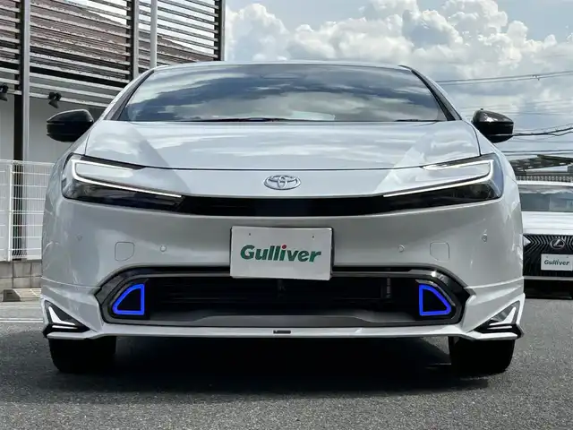 トヨタ プリウス Z 奈良県 2024(令6)年 1.6万km プラチナホワイトパールマイカ 1オーナー/モデリスタフルエアロ/モデリスタアルミ/純正メーカーナビ/TV/BT//アラウンドビューカメラ/追従式クルコン/コーナーセンサー/レーンキープアシスト/ETC2.0/バックカメラ/電動リアゲート/パワーシート/フルフラットシート/シートヒーター/エアシート/置くだけ充電/オートLEDライト/保証書・取説・スペアキー付