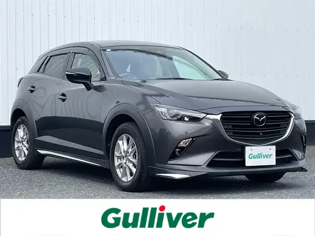 マツダ ＣＸ－３ 15S アーバンドレッサー 千葉県 2020(令2)年 1.7万km マシーングレープレミアムM ワンオーナー/純正SDナビ/(フルセグTV/BT/CD/DVD/FM/AM)/全周囲カメラ/前後ドライブレコーダー/ヘッドアップディスプレイ/ステアリングヒーター/衝突被害軽減システム/車線逸脱警報/クルーズコントロール/ハーフレザーシート/横滑り防止装置/ETC/アイドリングストップ/LEDヘッドライト/フォグランプ/オートライト/ウィンカーミラー/電動格納ミラー/純正16インチAW/シートヒーター/シートリフター/プッシュスタート/スマートキー/フロアマット/ドアバイザー/スペアキー/取扱説明書/保証書