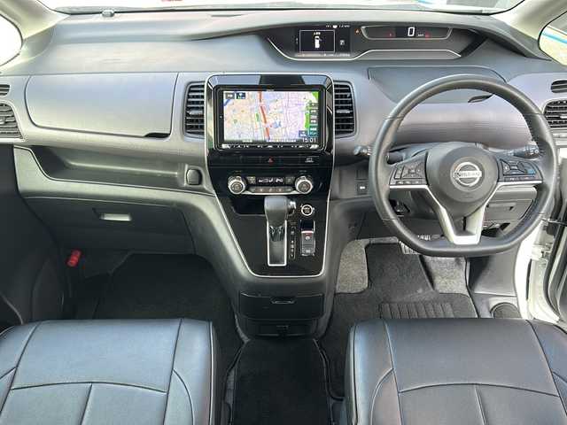 日産 セレナ ハイウェイスター V 広島県 2021(令3)年 3.8万km ブリリアントホワイトパール 2トーン 禁煙車/セーフティパックA/エマージェンシーブレーキ/車線逸脱警報/標識認識機能/速度標識認識/ハイビームアシスト/BSW/コーナーセンサー/プロパイロット/インテリジェントルームミラー/電動パーキングブレーキ/ブレーキホールド/社外９型ナビ（MDV-M907HDL）/・フルセグTV/・CD/DVD//・Bluetooth/・SD/音楽録音/アラウンドビューモニター/社外フリップダウンモニター（TVM-FW1020）/ステアリングスイッチ/革巻きステアリング/オートライト/LEDヘッドライト/フォグランプ/シートカバー/ETC/純正16インチアルミホイール/W+サイド+カーテンエアバック