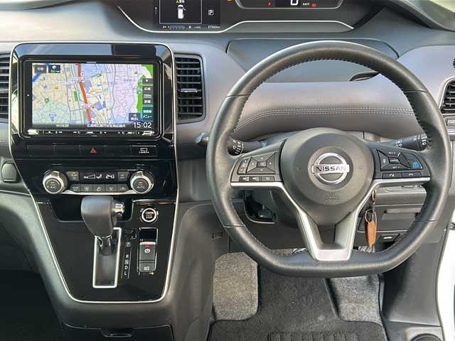 日産 セレナ ハイウェイスター V 広島県 2021(令3)年 3.8万km ブリリアントホワイトパール 2トーン 禁煙車/セーフティパックA/エマージェンシーブレーキ/車線逸脱警報/標識認識機能/速度標識認識/ハイビームアシスト/BSW/コーナーセンサー/プロパイロット/インテリジェントルームミラー/電動パーキングブレーキ/ブレーキホールド/社外９型ナビ（MDV-M907HDL）/・フルセグTV/・CD/DVD//・Bluetooth/・SD/音楽録音/アラウンドビューモニター/社外フリップダウンモニター（TVM-FW1020）/ステアリングスイッチ/革巻きステアリング/オートライト/LEDヘッドライト/フォグランプ/シートカバー/ETC/純正16インチアルミホイール/W+サイド+カーテンエアバック