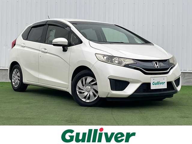 ホンダ フィット 13G Lパッケージ 香川県 2014(平26)年 8万km プレミアムホワイトパール 純正７型ＳＤナビ/・Bluetooth/・AM/FM/・ワンセグTV/ＥＴＣ/ＬＥＤヘッドライト/純正フロアマット/プッシュスタート/スマートキー/アイドリングストップ/パワーステアリング/パワーウィンドウ/オートライト/盗難防止装置/横滑り防止装置/ＡＢＳ/Wエアバッグ