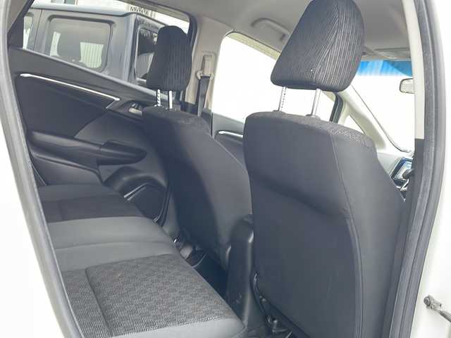 ホンダ フィット 13G Lパッケージ 香川県 2014(平26)年 8万km プレミアムホワイトパール 純正７型ＳＤナビ/・Bluetooth/・AM/FM/・ワンセグTV/ＥＴＣ/ＬＥＤヘッドライト/純正フロアマット/プッシュスタート/スマートキー/アイドリングストップ/パワーステアリング/パワーウィンドウ/オートライト/盗難防止装置/横滑り防止装置/ＡＢＳ/Wエアバッグ