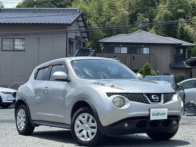 日産 ジューク 15RX 熊本県 2010(平22)年 18.5万km ダイヤモンドシルバー 社外ナビ（CN-RE07WD）/【フルセグTV/CD/DVD/Bluetooth/ラジオ】/バックカメラ/ETC/オートライト/電動格納ミラー/純正フロアマット/純正ドアバイザー/取扱説明書
