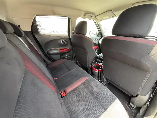 日産 ジューク 15RX 熊本県 2010(平22)年 18.5万km ダイヤモンドシルバー 社外ナビ（CN-RE07WD）/【フルセグTV/CD/DVD/Bluetooth/ラジオ】/バックカメラ/ETC/オートライト/電動格納ミラー/純正フロアマット/純正ドアバイザー/取扱説明書