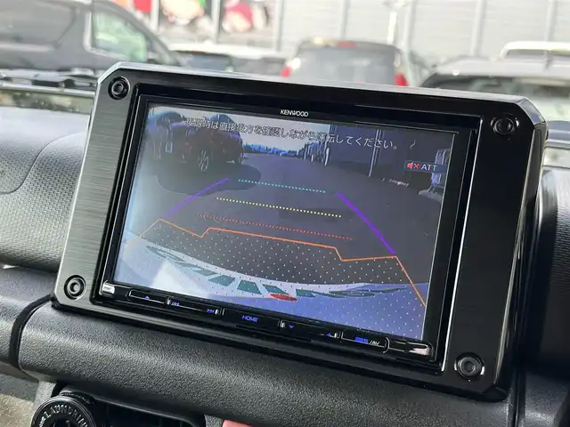 スズキ ジムニー シエラ JC 滋賀県 2023(令5)年 1.2万km キネティックイエロー/ブラック 禁煙車/純正ナビ/Bluetooth/SD/USB/フルセグテレビ/バックカメラ/シートヒーター /クルーズコントロール/ビルトインETC/セーフティサポート/・デュアルセンサーブレーキサポート/・車線逸脱警報機能/・ふらつき警報機能/・先行車発進お知らせ機能/・標識認識機能/・ハイビームアシスト/LEDヘッドライト/ドライブレコーダー