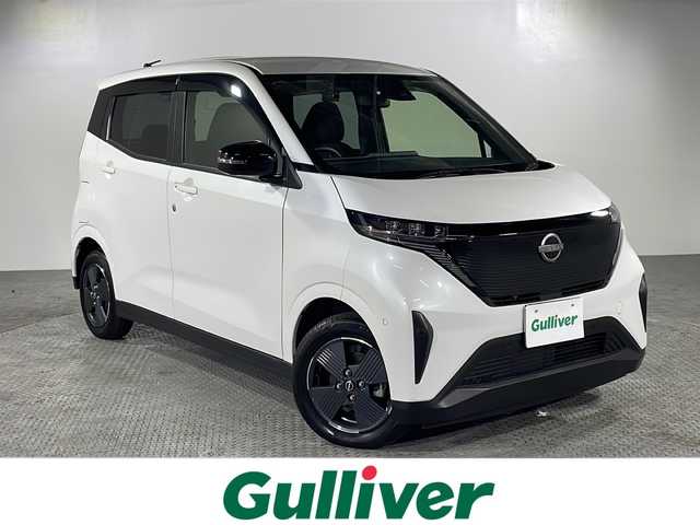 日産 サクラ X 沖縄県 2022(令4)年 1万km ホワイトパール 県外仕入　/禁煙車　/純正１０インチナビ（ＢＴ，フルセグ，ＣＤ／ＤＶＤ，ラジオ）　/アラウンドビューモニター　/コーナーセンサー/ハイビームアシスト/ベンチシート/ドライブレコーダー　/ビルドインＥＴＣ　/純正フロアマット　/ＬＥＤヘッドライト/LEDリヤコンビネーションランプ/純正14インチアルミホイール
