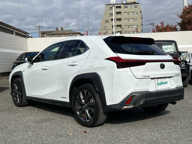 レクサス ＵＸ 250h Fスポーツ 東京都 2021(令3)年 2.2万km ホワイトノーヴァガラスフレーク ワンオーナー/新車時保証書 整備記録簿/取扱説明書　ナビ説明書/レーンキープアシスト/プリクラッシュセーフティー/レーダークルーズコントロール/BSM/純正メーカーSDナビ/フルセグTV/SD/CD/DVD/BD/SDREC/BT/USB/AUX/全方位カメラ　前後ドライブレコーダー/ビルトインETC【2.0】/ヘッドアップディスプレイ/白色レザーシート/シートヒーター/エアシート/フロントパワーシート【運転席メモリー付】/LEDヘッドライト/ハンドルヒーター/電動リアゲート/スマートキー×2/スマートカードキー×1/パドルシフト付革まきハンドル/純正18インチアルミ