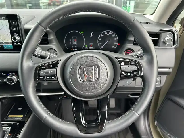 ホンダ ヴェゼル ハイブリッド e:HEV Z 栃木県 2023(令5)年 0.9万km サンドカーキパール ホンダセンシング/純正ワイドナビ/フルセグTV/Bluetooth/USB/スマホ連携/バックカメラ/ビルトインETC2.0/前後ドライブレコーダー/ハーフレザーシート/シートヒーター/ワイヤレス充電/ステアリングヒーター/シーケンシャルウィンカー/パワーバックドア/電子パーキングブレーキ/ブラインドスポットモニター/ヒルディセントコントロール/スマートキー