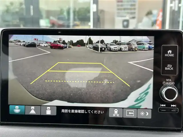 ホンダ ヴェゼル ハイブリッド e:HEV Z 栃木県 2023(令5)年 0.9万km サンドカーキパール ホンダセンシング/純正ワイドナビ/フルセグTV/Bluetooth/USB/スマホ連携/バックカメラ/ビルトインETC2.0/前後ドライブレコーダー/ハーフレザーシート/シートヒーター/ワイヤレス充電/ステアリングヒーター/シーケンシャルウィンカー/パワーバックドア/電子パーキングブレーキ/ブラインドスポットモニター/ヒルディセントコントロール/スマートキー