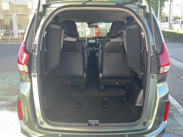 ホンダ フリード ハイブリット クロスター ホンダセンシング 愛知県 2022(令4)年 1.3万km シルバーミストグリーンM /禁煙車//ワンオーナー//純正ナビ【VXM-224VFi】//フルセグTV・DVD・Bluetooth//両側パワースライドドア//LEDヘッドライト+アクティブコーナリングライト//オートライト//CROSSTAR専用装備//ルーフレール//純正15インチアルミホイール//木目調インパネミドルエリア//コンビシート(プライムスムース×ファブリック)//Cパッケージ（ロールサンシェード、IRカット、コンフォートビューパッケージ、D/N席シートヒーター、プラズマクラスター技術搭載フルオートエアコン//HondaSENSING//衝突軽減ブレーキ//先行車発進お知らせ機能//歩行者事故低減ステアリング//路外逸脱抑制機能//アダプティブクルーズコントロール//レーンキープアシスト//誤発進抑制苦悩//後方誤発進抑制機能//電動格納式ウインカーミラー//オートリトラミラー//純正フロアマット//ステアリングスイッチ//ETC//オートライト//スペアキー//新車保証書//取扱説明書