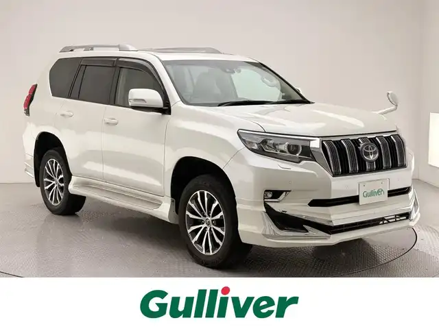 トヨタ ランドクルーザー プラド TX Lパッケージ 兵庫県 2021(令3)年 5.8万km ホワイトパールクリスタルシャイン 純正9インチナビ/(NSZT-Y68T)/フルセグ CD DVD BT MSV HDMI/バックカメラ/ビルトインETC/ドライブレコーダー/サンルーフ/レーダークルーズコントロール/プリクラッシュセーフティー/LDA/RSA/クリアランスソナー/レザーシート/シートヒーター/ベンチレーション/パワーシート/電動格納サードシート/ルーフレール/LEDヘッドライト/LEDフォグライト/オートライト/オートハイビーム/社外ツィーター/社外エアロ/純正19インチアルミホイール/取扱い説明書/新車時保証書