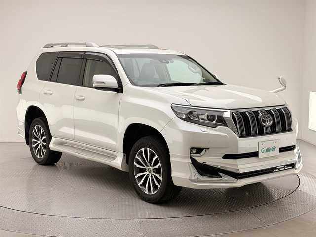 トヨタ ランドクルーザー プラド TX Lパッケージ 兵庫県 2021(令3)年 5.8万km ホワイトパールクリスタルシャイン 純正9インチナビ/(NSZT-Y68T)/フルセグ CD DVD BT MSV HDMI/バックカメラ/ビルトインETC/ドライブレコーダー/サンルーフ/レーダークルーズコントロール/プリクラッシュセーフティー/LDA/RSA/クリアランスソナー/レザーシート/シートヒーター/ベンチレーション/パワーシート/電動格納サードシート/ルーフレール/LEDヘッドライト/LEDフォグライト/オートライト/オートハイビーム/社外ツィーター/社外エアロ/純正19インチアルミホイール/取扱い説明書/新車時保証書