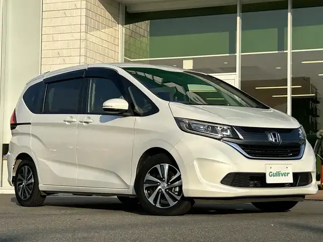 ホンダ フリード＋ G ホンダセンシング 兵庫県 2019(令1)年 2.7万km ホワイトオーキッドパール 純正9インチナビ/BTオーディオ/フルセグTV/横滑り防止装置/レーンキープアシスト/衝突被害軽減システム/バックカメラ/ビルトインETC/ドライブレコーダー/純正フロアマット/純正15インチアルミホイール/LEDオートライト/スペアキー