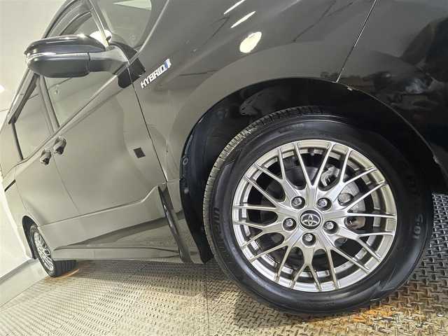 トヨタ ヴォクシー ハイブリッド ZS 愛知県 2017(平29)年 5.8万km ブラック 純正９インチナビ　/（AM/FM/CD・DVD再生/SD/Bluetooth/フルセグTV)/トヨタセーフティセンス　/　　プリクラッシュセーフティ/　　レーンディパーチャーアラート/　　オートマチックハイビーム/ビルトインＥＴＣ　/片側パワースライドドア　/シートヒーター　/バックカメラ　/クルーズコントロール　/ＵＳＢ接続　/車線逸脱警報　/純正フロアマット