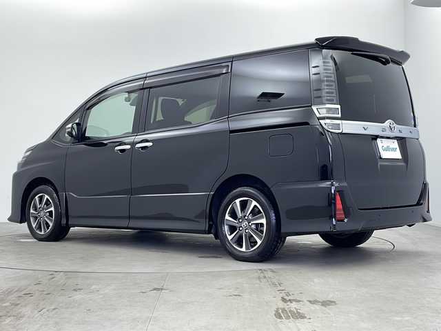トヨタ ヴォクシー ZS 煌Ⅱ 鹿児島県 2020(令2)年 4.6万km ブラック 純正10インチSDナビ/（Bluetooth/フルセグTV/FM/AM/CD/DVD）/純正フリップダウンモニター/バックカメラ/両側パワースライドドア/社外前後ドライブレコーダー/ビルトインETC/オートライト/オートマチックハイビーム/LEDヘッドライト/前後コーナーセンサー/純正フロアマット/ドアバイザー/クルーズコントロール/スマートキー/プッシュスタート