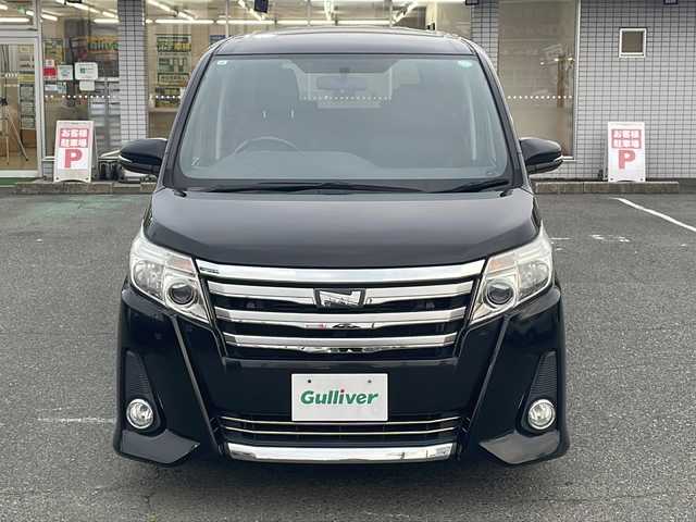 トヨタ ノア Si サイドリフトアップ 愛知県 2015(平27)年 4.5万km ブラック /禁煙/ディーラー整備記録簿H30//メモリナビ/フルセグ/CD/DVD/BT/USB//助手席サイドリフトアップ//バックカメラ//革巻きステア/ステアスイッチ//純正16インチAW//純正フロアマット//純正ドアバイザー//プッシュスタート/スマートキー//サンシェード（セカンドシート）//右側パワースライドドア//アイドリングストップ//横滑り防止装置//HIDヘッドライト//オートライト//電格ミラー//新車時保証書//取扱説明書//スペアキー